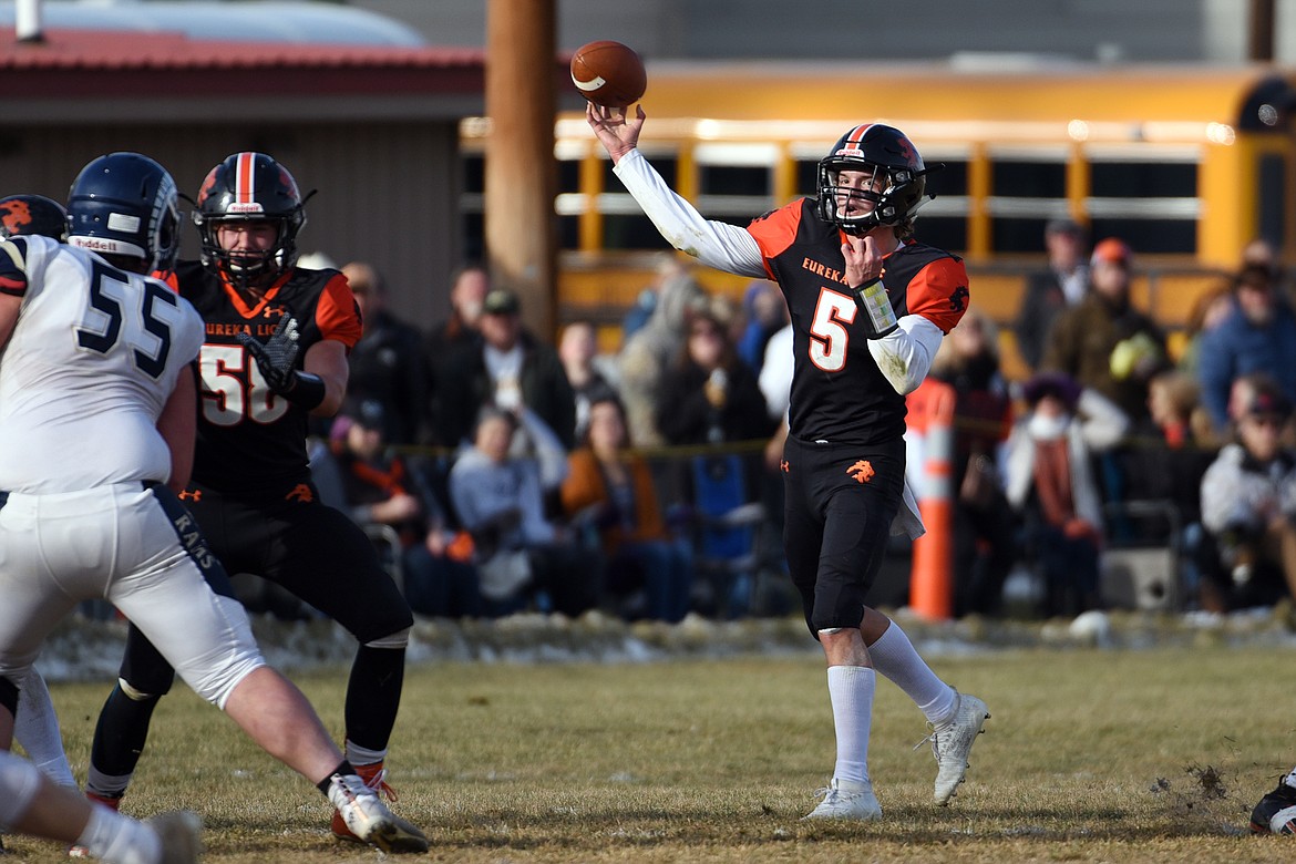 Eureka quarterback Hank Dunn (5) looks to throw in the first quarter against Red Lodge in the State Class B semifinal at Lincoln County High School in Eureka on Saturday. Eureka won, 39-35. (Casey Kreider/Daily Inter Lake)