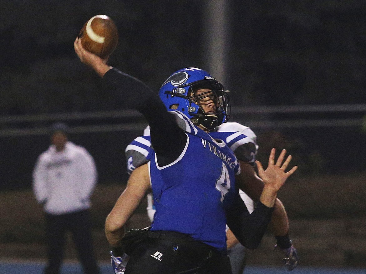 Coeur d&#146;Alene quarterback Jack Prka passes the ball during Friday night&#146;s game against Mountain View.