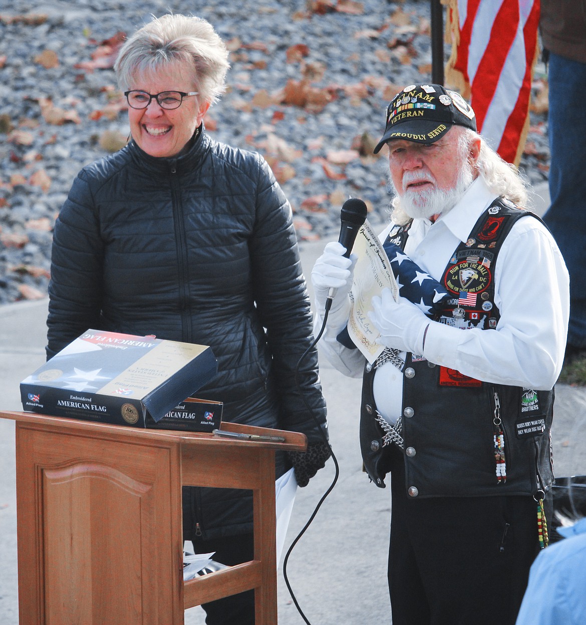 Photos by TONIA BROOKS
Karen Roetter, regional director for Senator Mike Crapo&#146;s (R-Idaho) office, presents the Spirit of Freedom Award to Vietnam War veteran, Ron McIlnay, during Monday&#146;s Veterans Day ceremony in Bonners Ferry.