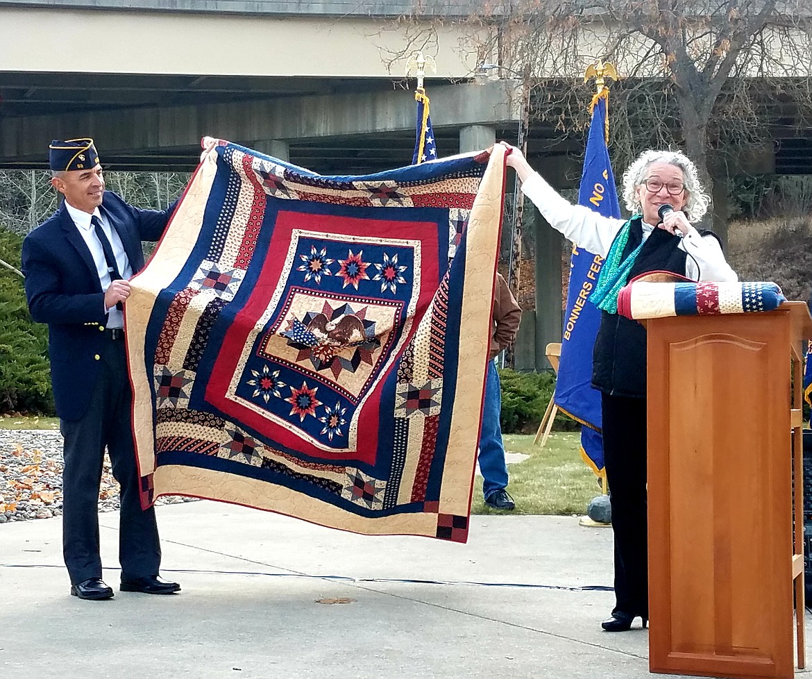 Photo by TONIA BROOKS
Margaret Pyette shows off her homemade quilts she has been presenting to selected veterans for the past nine years.