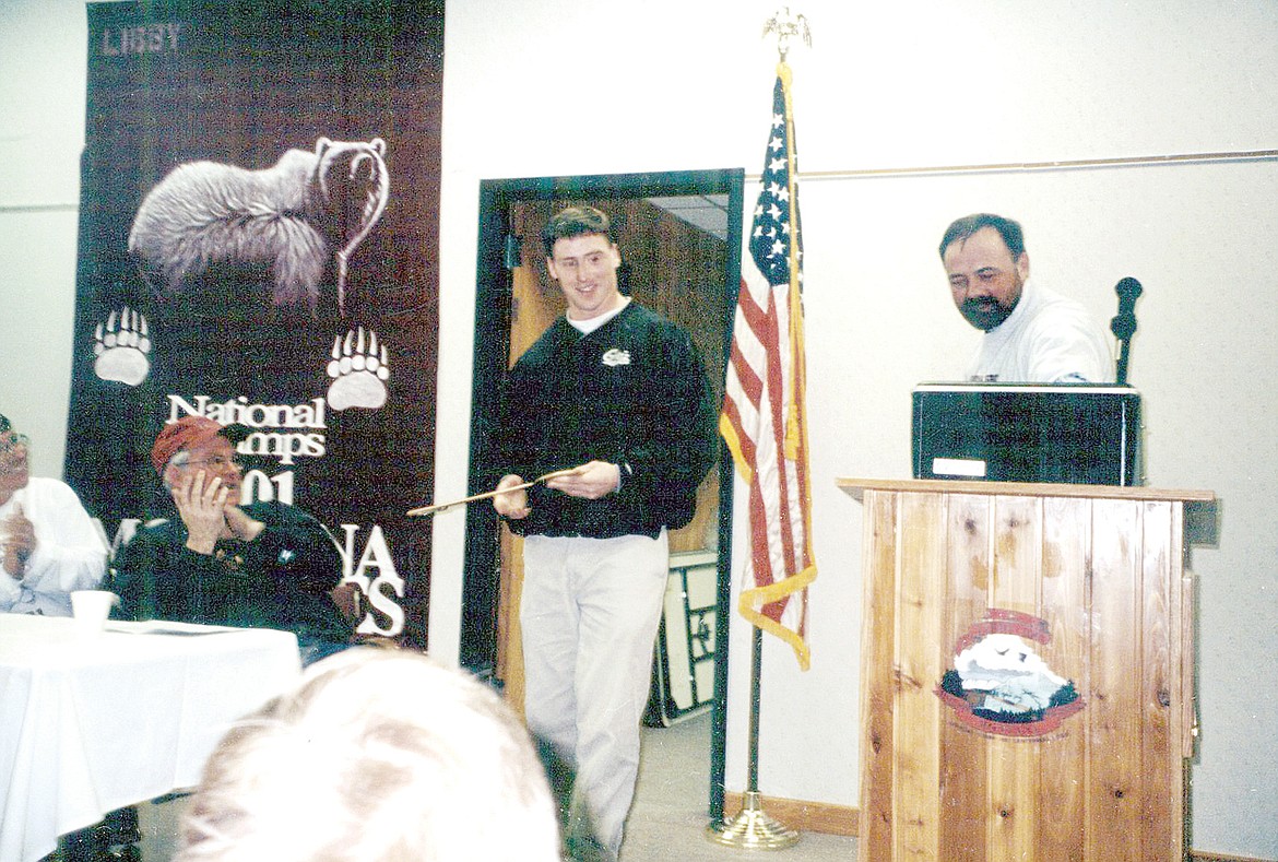 Gary Huntsberger, left, Vince Huntsberger and Libby Mayor Tony Berget.