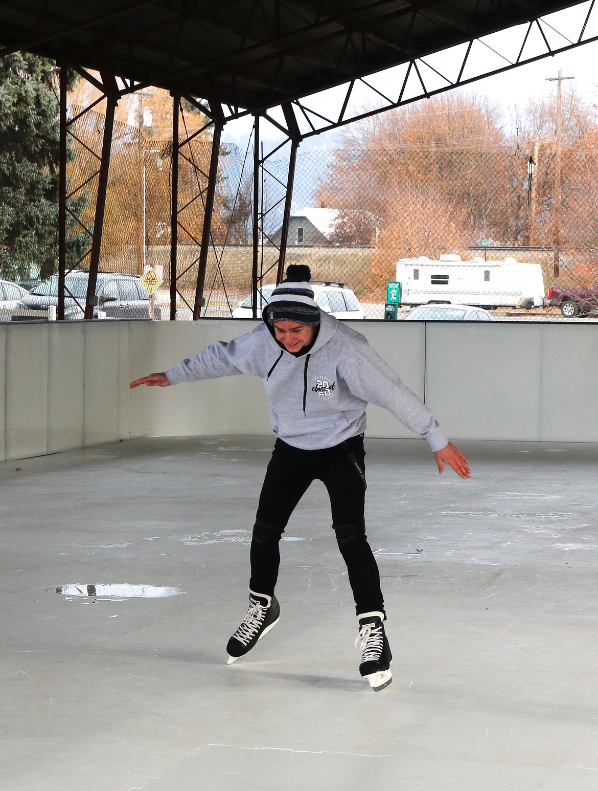 Photo by HECTOR MENDEZ JR.
Ben Tompkins, who gave the opening speech at the grand opening, tries out the ice rink.