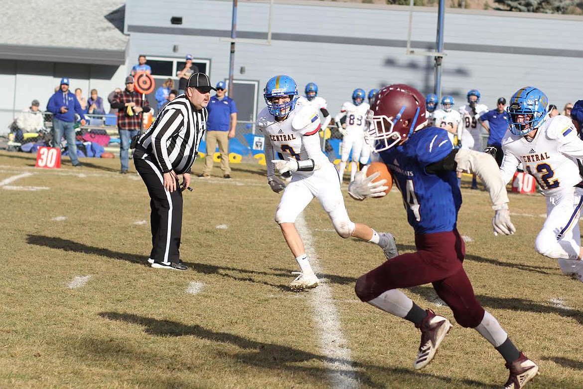 Clark Fork running back Jake Calloway breaks loose on a 42-yard touchdown run in the second quarter against Great Falls Central in Saturday's state semifinal game. The Mountain Cats won 44-14. (Chuck Bandel/Mineral Independent)