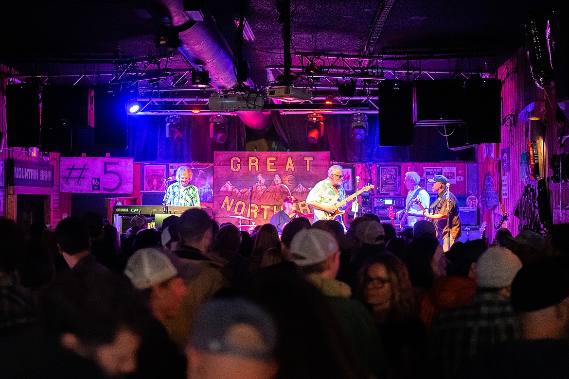 Party-goers crowd the stage during the Great Northern Bar and Grill&#146;s 100th anniversary celebration on Saturday. (Daniel McKay/Whitefish Pilot)