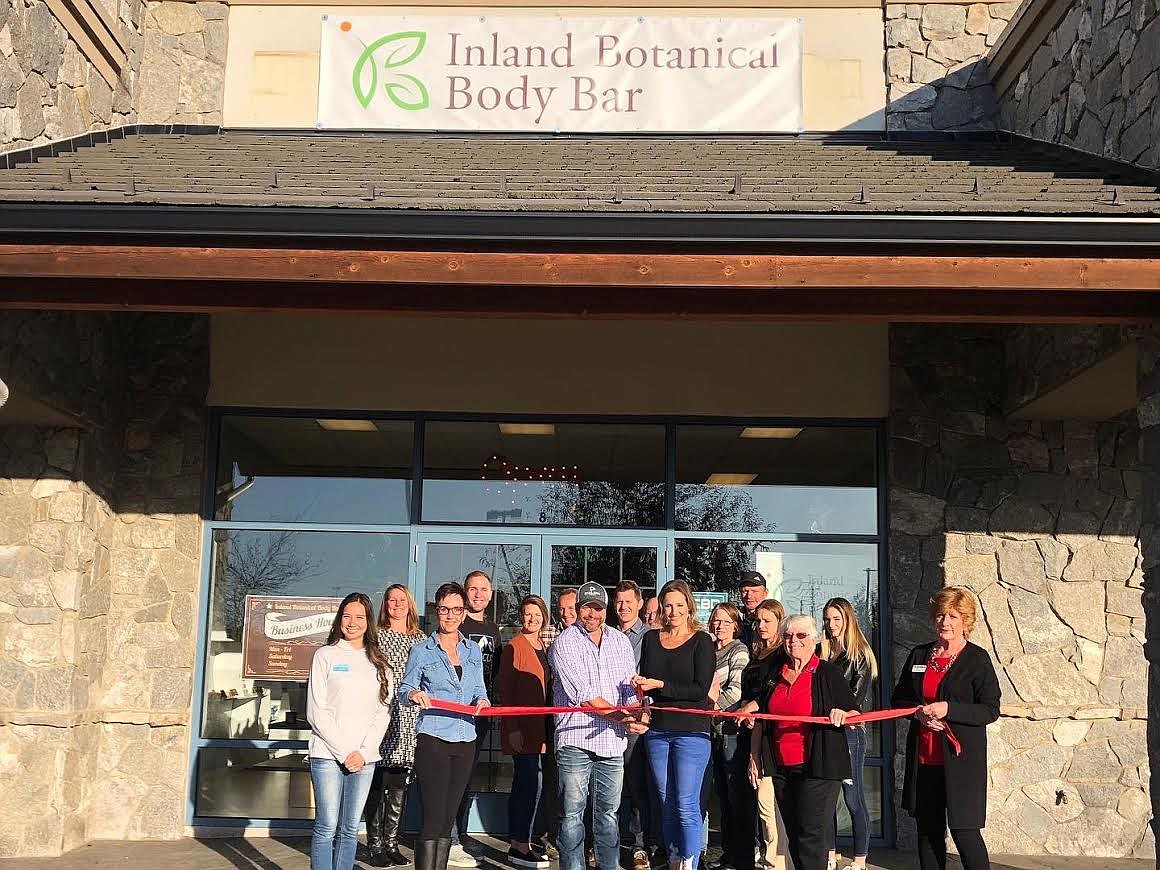 Courtesy photo
The staff of Inland Botanical Body Bar, a new business in Post Falls specializing in natural health and wellness products, takes part in a ribbon cutting ceremony.