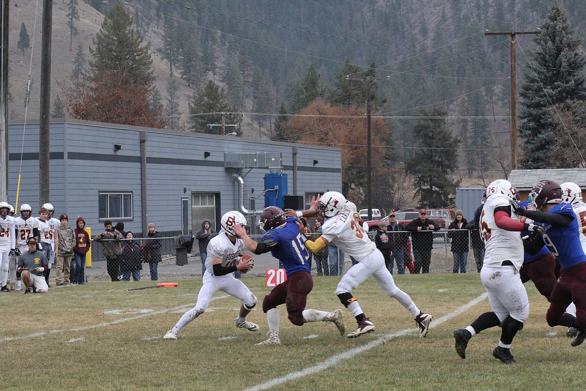 Clark Fork's Trey Green pressured the Belt quarterback during first half action Saturday. The Mountain Cats won 46-34 to advance to the state semifinals. (Chuck Bandel/Valley Press)