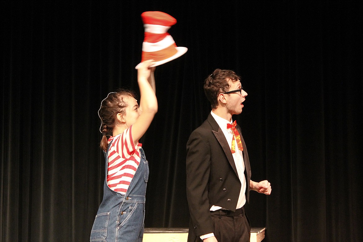 Rachal Pinkerton/Sun Tribune
Jojo (left) steals The Cat in the Hat&#146;s hat. Jojo and the Cat are part of the musical &#147;Seussical&#148; being performed by the Othello High School Drama Club this weekend. Jojo is played by Kassie Fletcher and the Cat is played by Parker Mills.