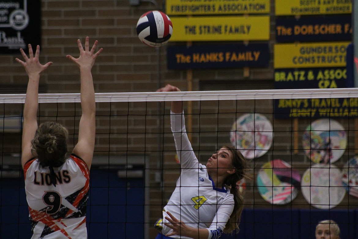 FILE PHOTO of Brooke Bowlin (4), from Thompson Falls, as she delivered a spike against Eureka, Saturday, Oct. 12. (John Dowd/Clark Fork Valley Press)