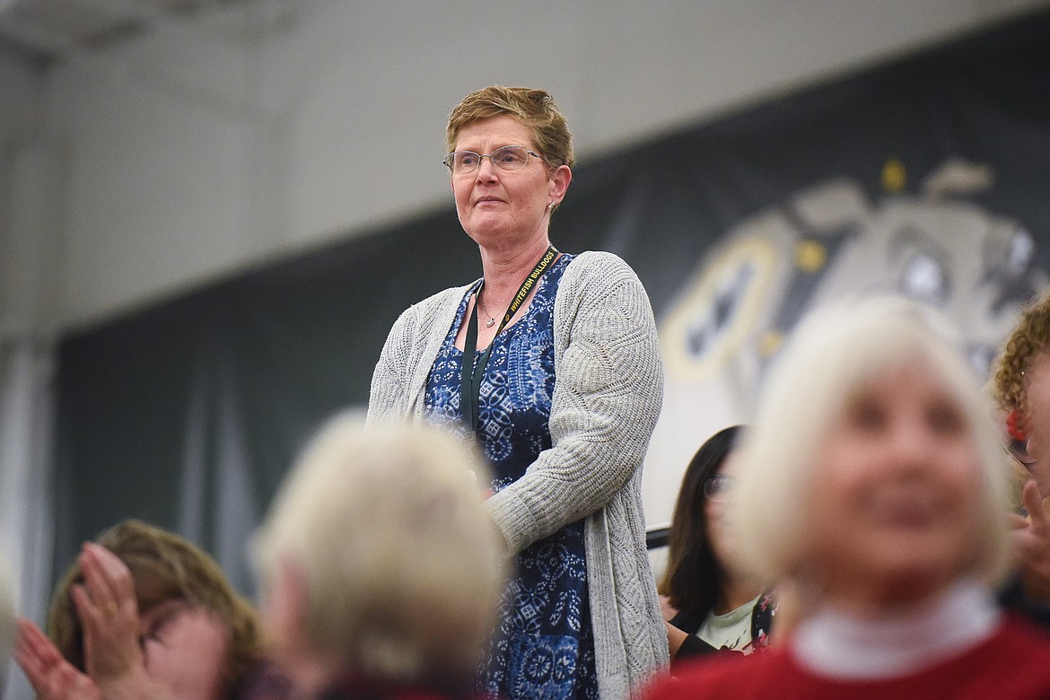 Whitefish Independent High School instructor Jill Weigland is recognized for her service during Monday&#146;s Veterans Day Assembly at Whitefish High School. (Daniel McKay/Whitefish Pilot)