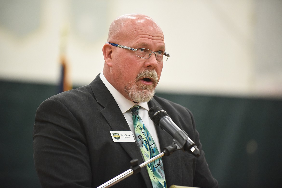 Principal Kerry Drown gives the opening remarks during Monday&#146;s Veterans Day Assembly at Whitefish High School. (Daniel McKay/Whitefish Pilot)