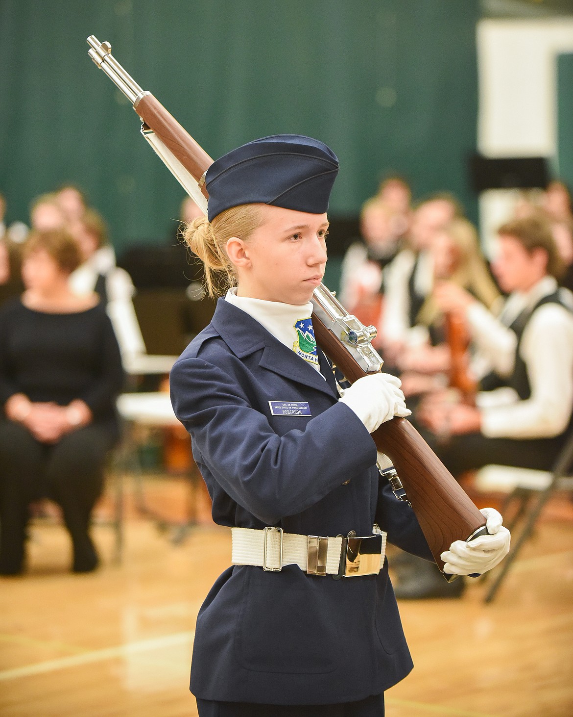 A member of the Flathead Composite Squadron, Civil Air Patrol presents arms during Monday&#146;s Veterans Day Assembly at Whitefish High School. (Daniel McKay/Whitefish Pilot)