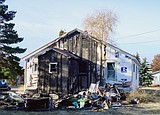 Camper destroyed in fire, house damaged