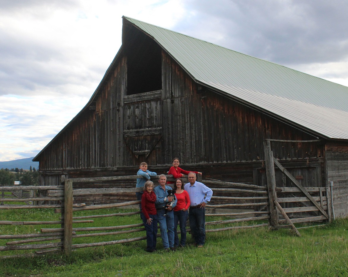 The descendants of the Quirk siblings stand outside the family ranch in Eureka. (Photo courtesy Montana Cowboy Hall of Fame)