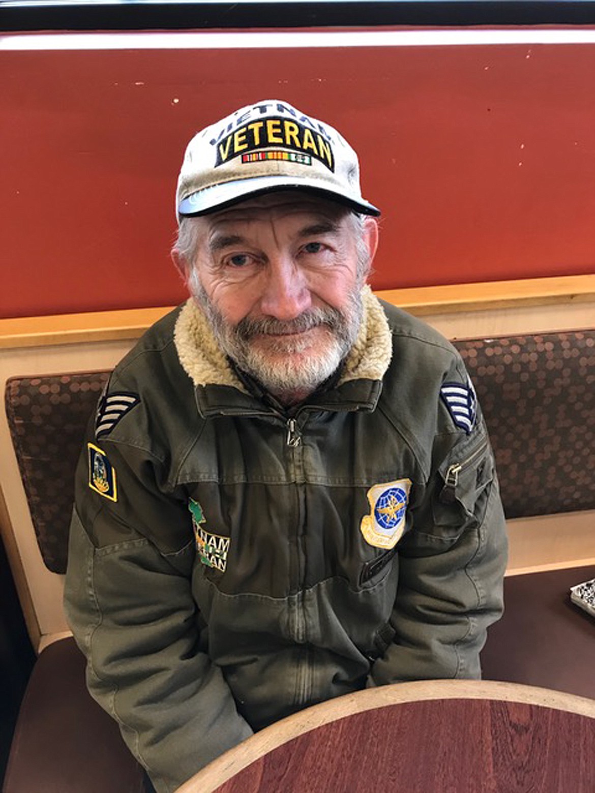(Photo by SUSAN DRINKARD)
Delmar Wood of Sandpoint wears his Vietnam jacket and hat while relaying his Vietnam experience in the 35th Combat Support Group on the Security Police Squadron in Phan Rang, Vietnam.