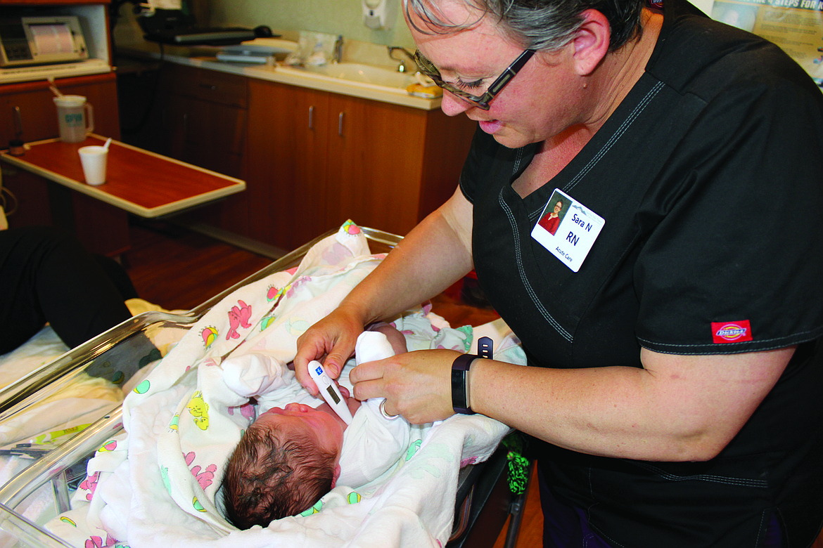 Clark Fork Valley Hospital&#146;s Sara Nestor, RN, CLC, OB Coordinator caring for a newborn baby. (Clark Fork Valley Hospital photo)