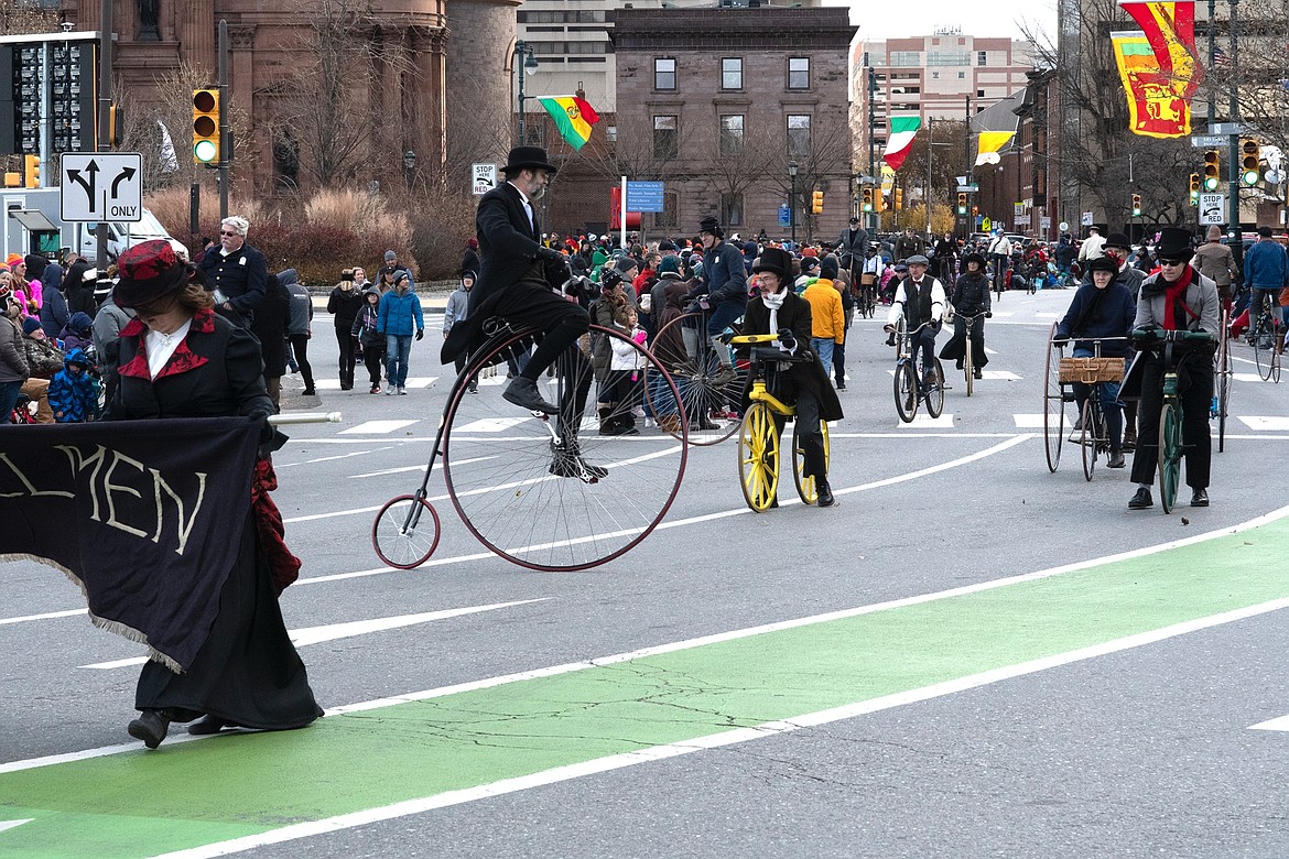 The magnificent Wheelmen, not all of whom are actually Men, dally on the public ways atop their frivolous conveyances. (JIM MOWREADER/Press)