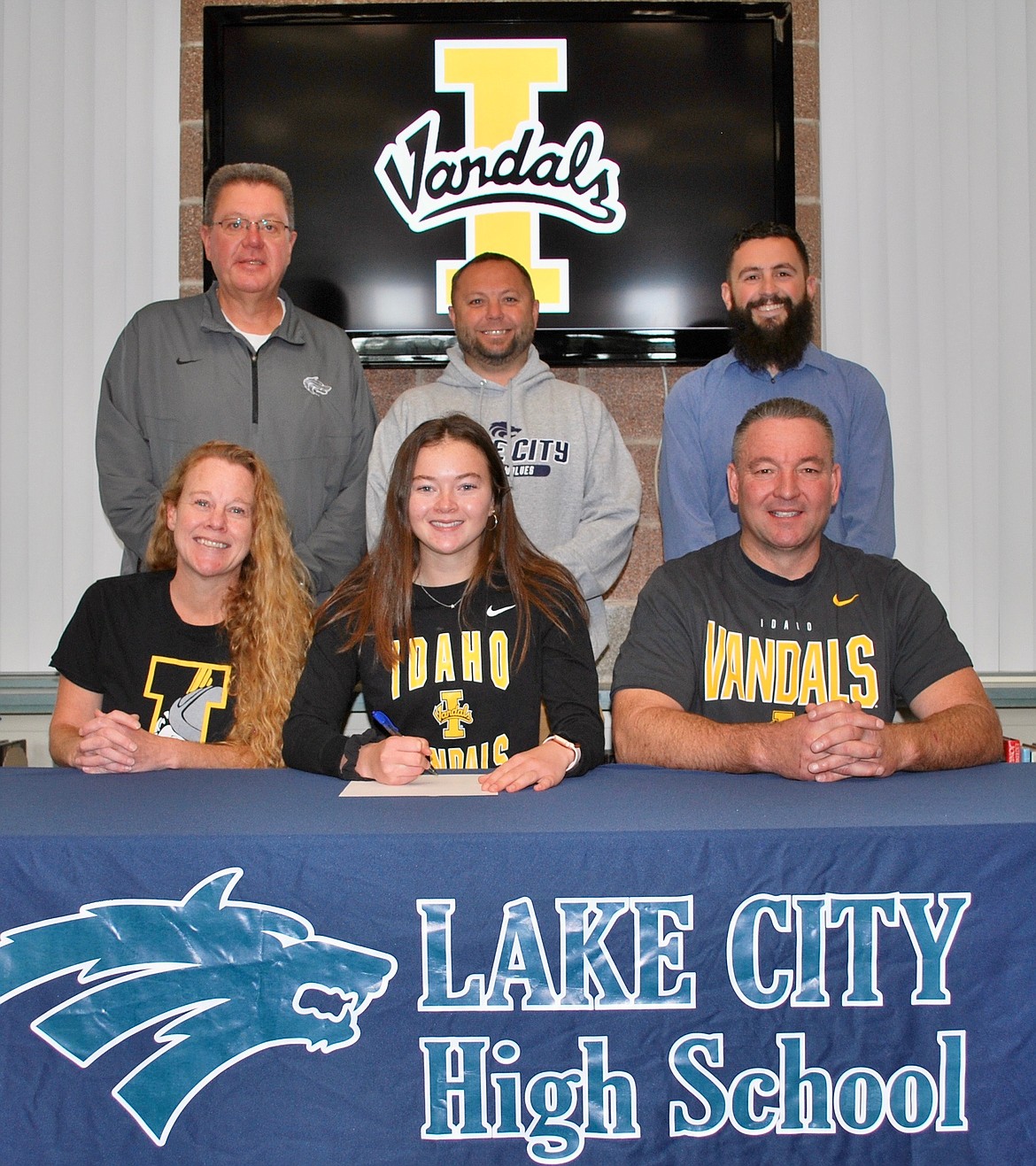 Courtesy photo
Lake City High senior Maddy Lasher recently signed a letter of intent to play soccer at Idaho. Seated from left are Sarah Lasher (mom), Maddy Lasher and Mike Lasher (dad); and standing from left, Jim Winger, Lake City High athletic director; Matt Ruchti, Lake City High girls soccer coach; and Nik Bjurstrom, Lake City High assistant girls soccer coach.