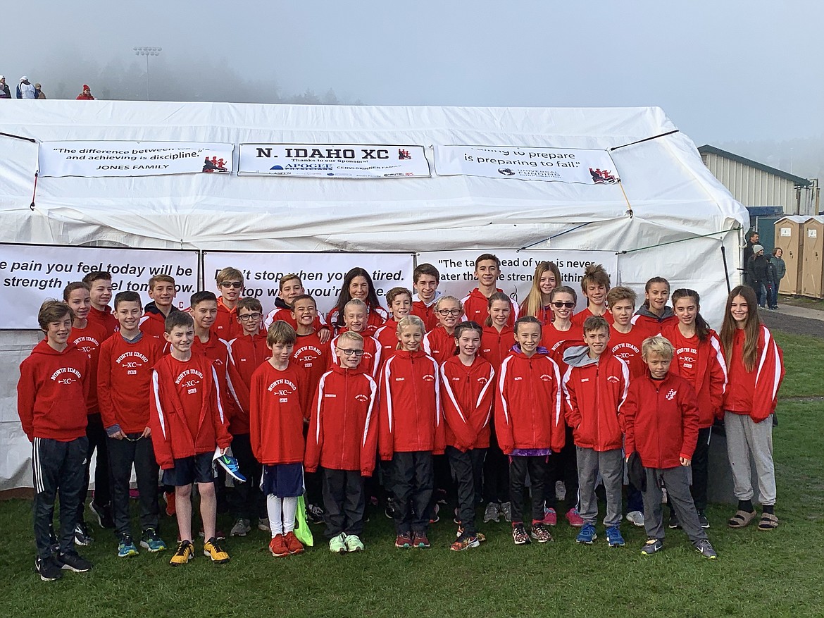 Courtesy photo
North Idaho XC qualified 30 for nationals from the USATF Junior Olympic Pacific Northwest XC Championship on Nov. 23 in Eugene, Ore. Nationals are Dec. 14 in Madison, Wis. Team members competing at regionals include, front row from left, Ronan Kennedy, Alistair Smith, Kingston Wilson, Paisley Ray, Olivia Abbey, Olivia May, Rowan Henry and Will Wood; second row from left, Nolan Oyler, Logan Anderson, Ethan Hickok, Sam Mandel, Mitchell Rietze, Adalyn Depew, Parker Sterling, Cambrie Stam, Helen Oyler, Natal Davis, Kellen Souza, Zara Munyer and Neala Hart; and back row from left, Ann Marie Dance, Nathan Russell, Max Cervi-Skinner, Neil McCarthy, Zack Cervi-Skinner, coach Erin Lydon Hart, Logan Davis, Max Bazler, Jenny Elliott, Lachlan May and Elliana Rietze.