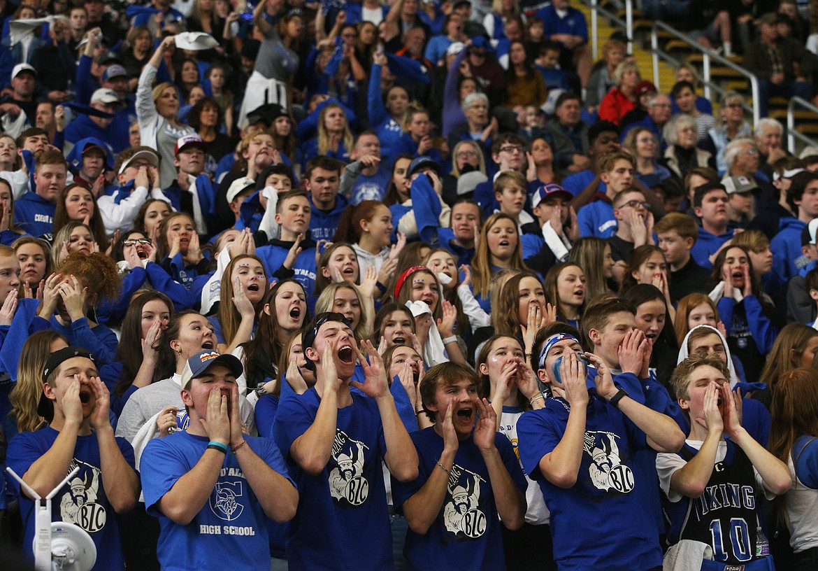 The Coeur d&#146;Alene Vikings student section cheers on their team during the state 5A football hampionship game against Rigby on Saturday at the Kibbie Dome in Moscow.