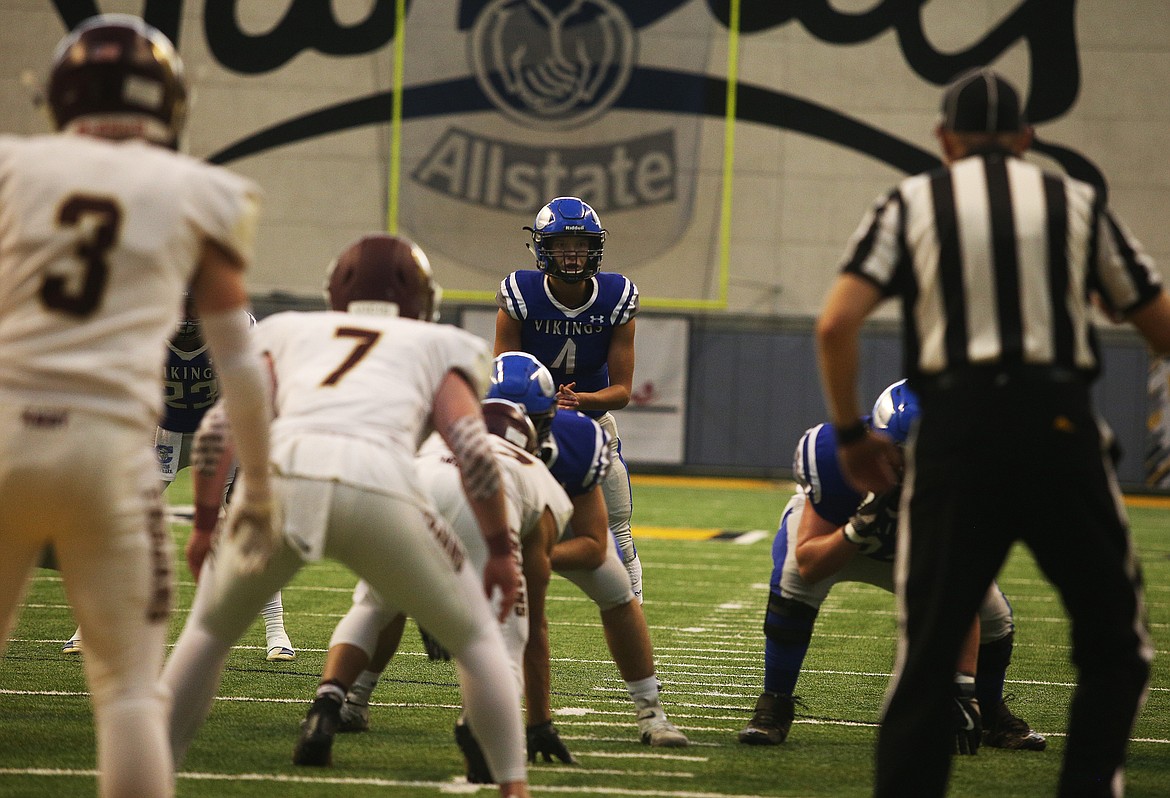 Coeur d&#146;Alene quarterback Jack Prka waits for the snap against Rigby.