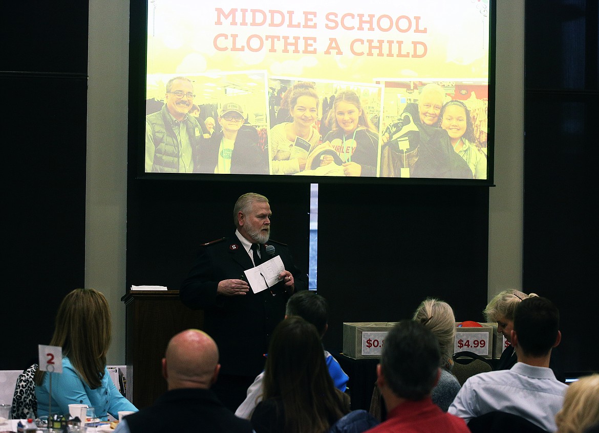 Salvation Army Kroc Center Major Don Gilger shares what Clothe A Child is during the center's Kettle Kickoff breakfast. (LOREN BENOIT/Press)