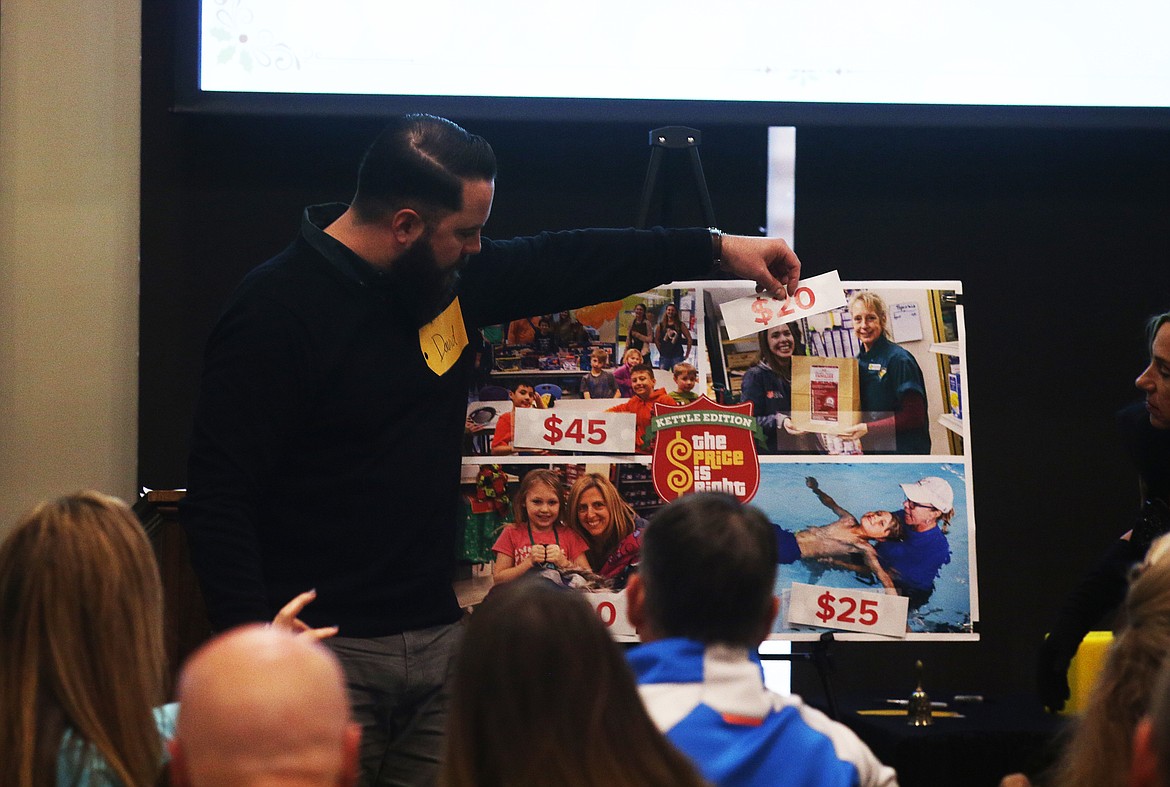 David Bobbitt plays a game of &#147;The Price is Right&#148; Friday morning at the Salvation Army Kroc Center&#146;s Kettle Kickoff breakfast.