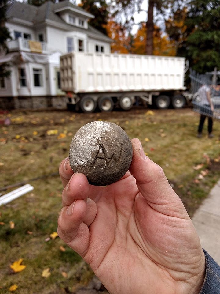 Photo courtesy of John Swallow
This mortar ball, with the initials &#145;A.W.&#146; on it, was found under the porch of the J.C. White House after it moved last weekend. It is among several interesting artifacts found after the historic Coeur d&#146;Alene home was moved from its Sherman Avenue location to the base of Tubbs Hill. For the full story, see page A6.