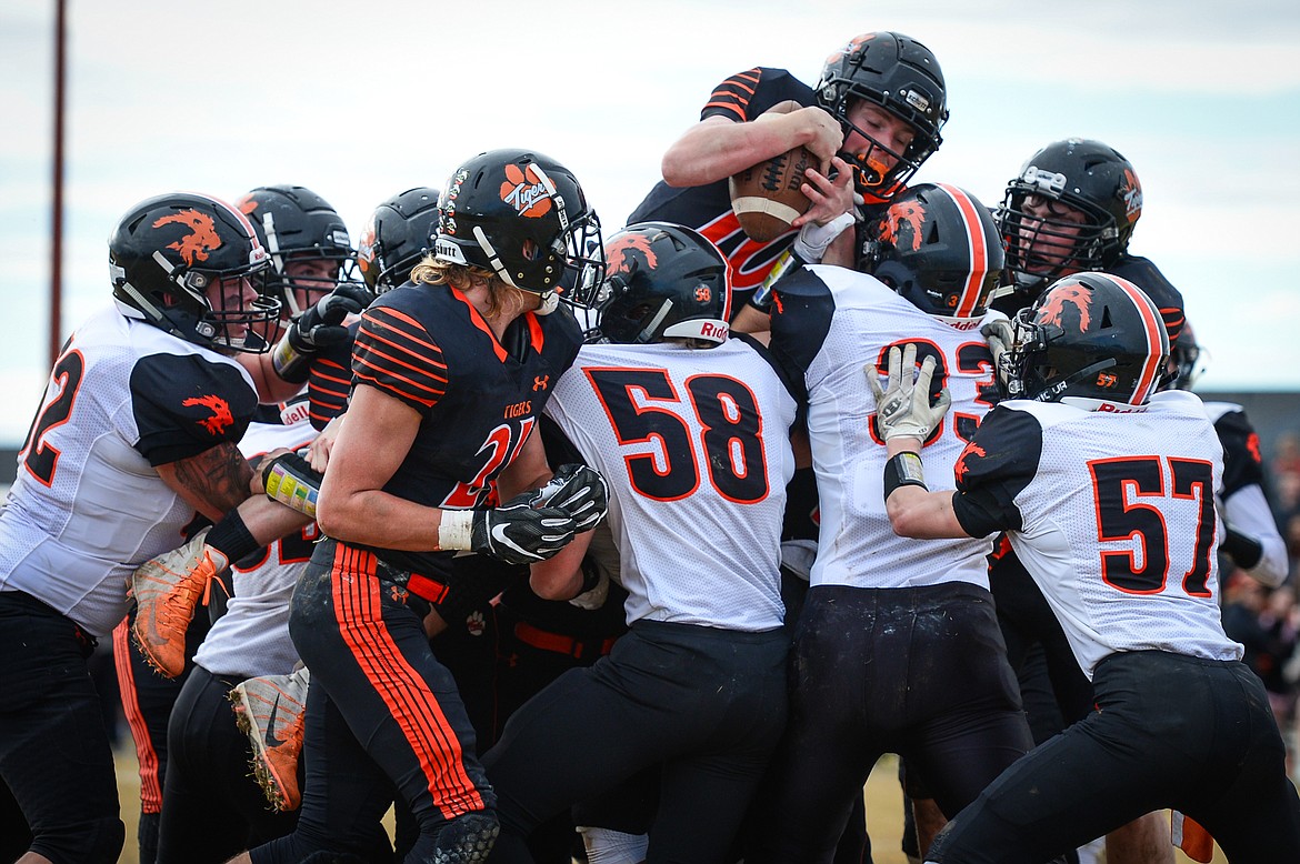 Manhattan quarterback Lane Veltkamp (10) scores a touchdown in the second quarter against Eureka in the Class B State Championship against Eureka on Saturday. (Casey Kreider/Daily Inter Lake)