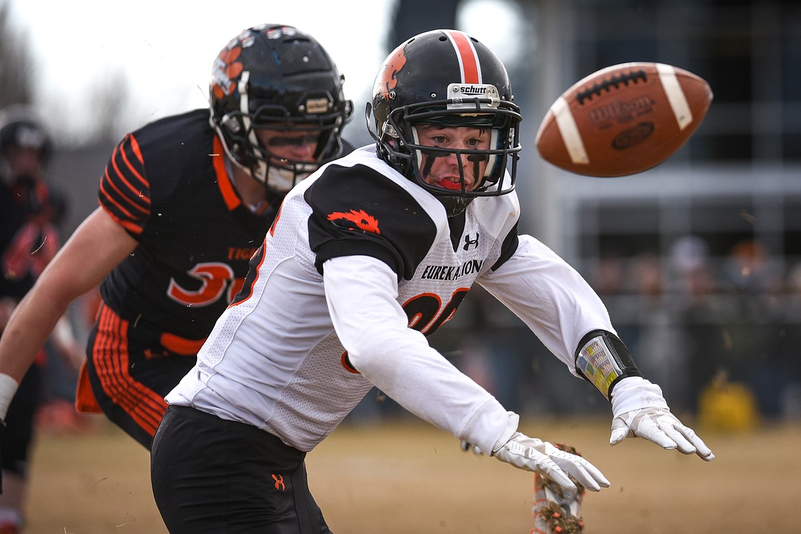 Eureka running back Chance Muller (36) fumbles on a first-quarter run against Manhattan in the Class B State Championship in Manhattan on Saturday. Eureka recovered the fumble. (Casey Kreider/Daily Inter Lake)