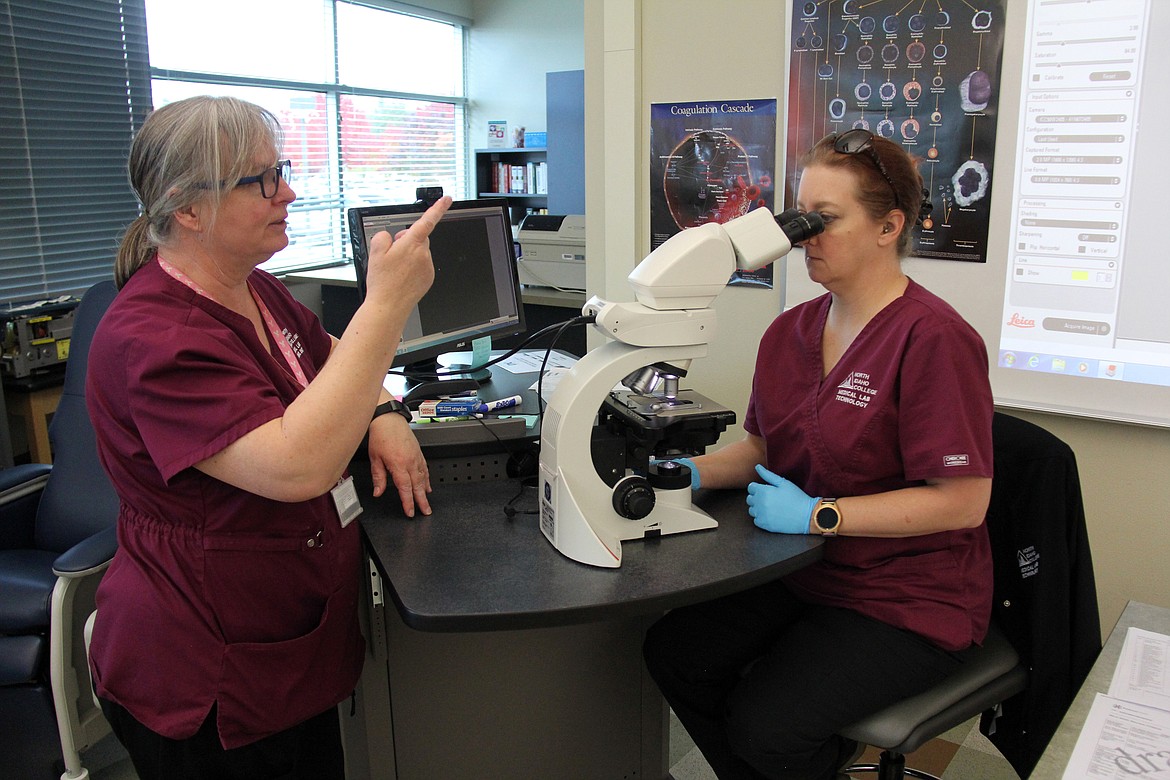 (Courtesy photo) North Idaho College Medical Laboratory Technology Program Director Sonja Nehr-Kanet instructs a student.