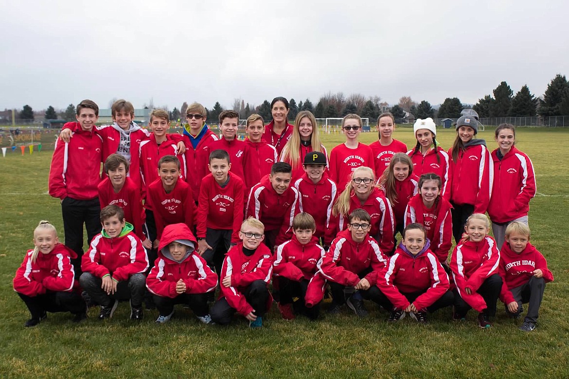 Courtesy photo
The North Idaho XC team competed at the USATF Inland Northwest Association Junior Olympic cross country championship on Saturday at Lake City High. In the front row from left are Adalyn Depew, Parker Sterling, Rowan Henry, Kingston Wilson, Alistair Smith, Sam Mandel, Olivia May, Paisley Ray and Will Wood; second row from left, Nolan Oyler, Mitchell Rietze, Logan Anderson, Ethan Hickok, Ronan Kennedy, Cambrie Stam, Helen Oyler and Olivia Abbey; and back row from left, Logan Davis, Lachlan May, Max Cervi-Skinner, Neil McCarthy, Nathan Russell, Zack Cervi-Skinner, coach Erin Lydon Hart, Jenny Elliott, Natal Davis, Ann Marie Dance, Zara Munyer, Elliana Rietze and Neala Hart. Not pictured are Max Bazler and Kellen Souza.