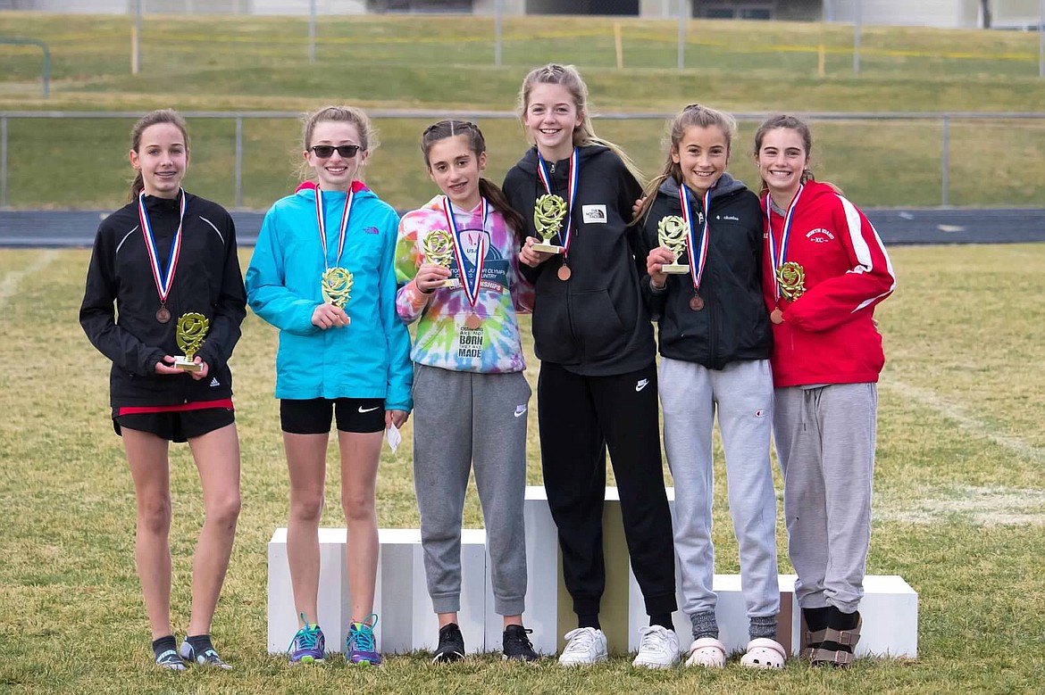 Courtesy photo
The North Idaho XC team won the the U13-14 girls (4,000 meters) team title at the USATF Inland Northwest Association Junior Olympic cross country championship on Saturday at Lake City High. From left are Ann Marie Dance (5th, 16:16.79), Natal Davis (7th, 17:07.48), Zara Munyer (4th, 15:56.68), Jenny Elliott (6th, 16:48.19), Elliana Rietze (3rd, 15:49.97) and Neala Hart (11th, 18:52.59).