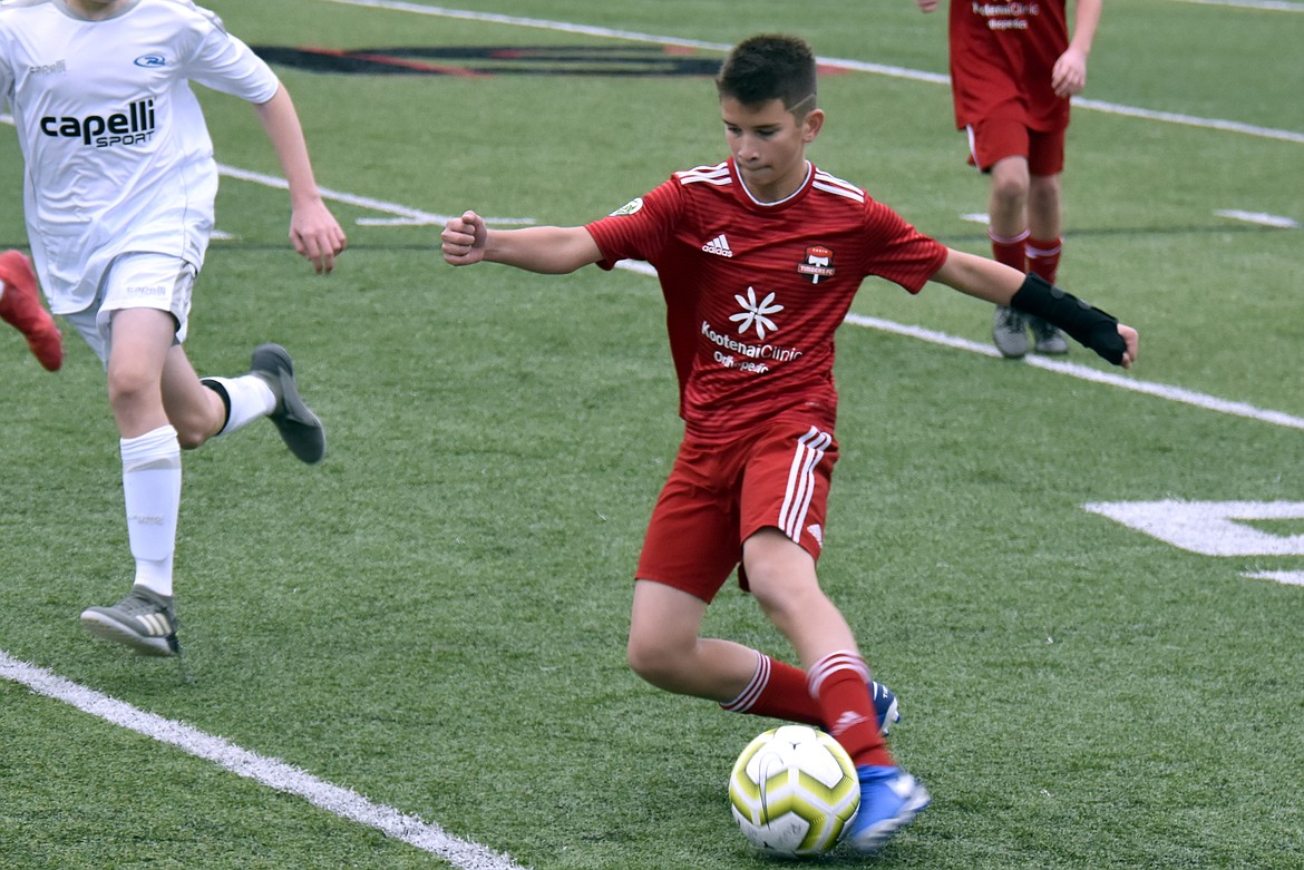 Photo by SUZI ENTZI
This past weekend the Timbers North FC 06 Boys Red soccer team traveled to Seattle. On Saturday in Puyallup, Wash., the Timbers fell to Washington Premier FC White 6-0. On Sunday in Everett, Wash., they tied the Washington Rush Nero B 1-1. Kai Delio had the Timbers goal with the assist by Jacob Molina. Braden Latscha defended the goal for TNFC.
Pictured is Michael Chan of the Timbers.