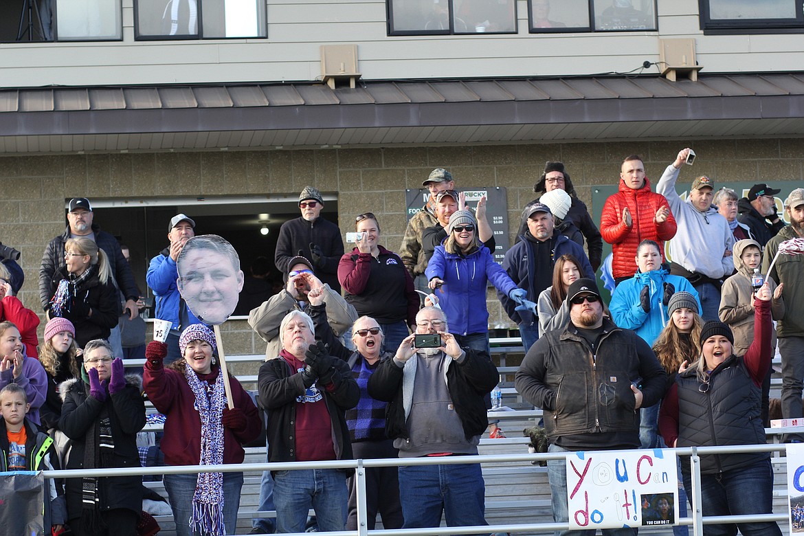 Fans of the Clark Fork Mountain Cats football team cheer on the team that consists of players from Alberton and Superior.