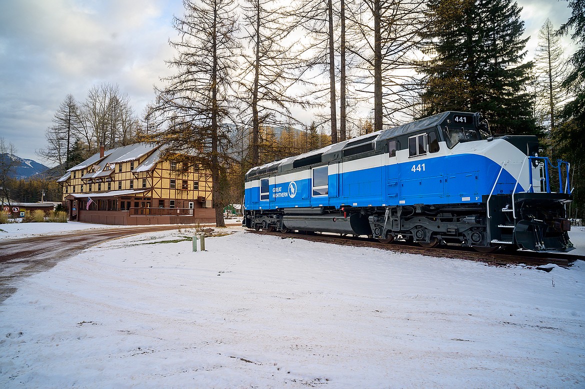 The Izaak Walton Inn today. Guests can also stay in converted luxury railcars, like the engine in the foreground.