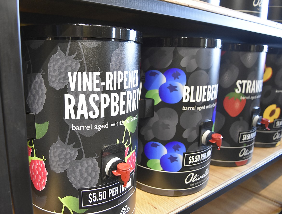 A main feature of Trovare is products by Olivelle, a specialty food retail store in Bozeman, including their infused olive oils and vinegars. (Heidi Desch/Whitefish Pilot)