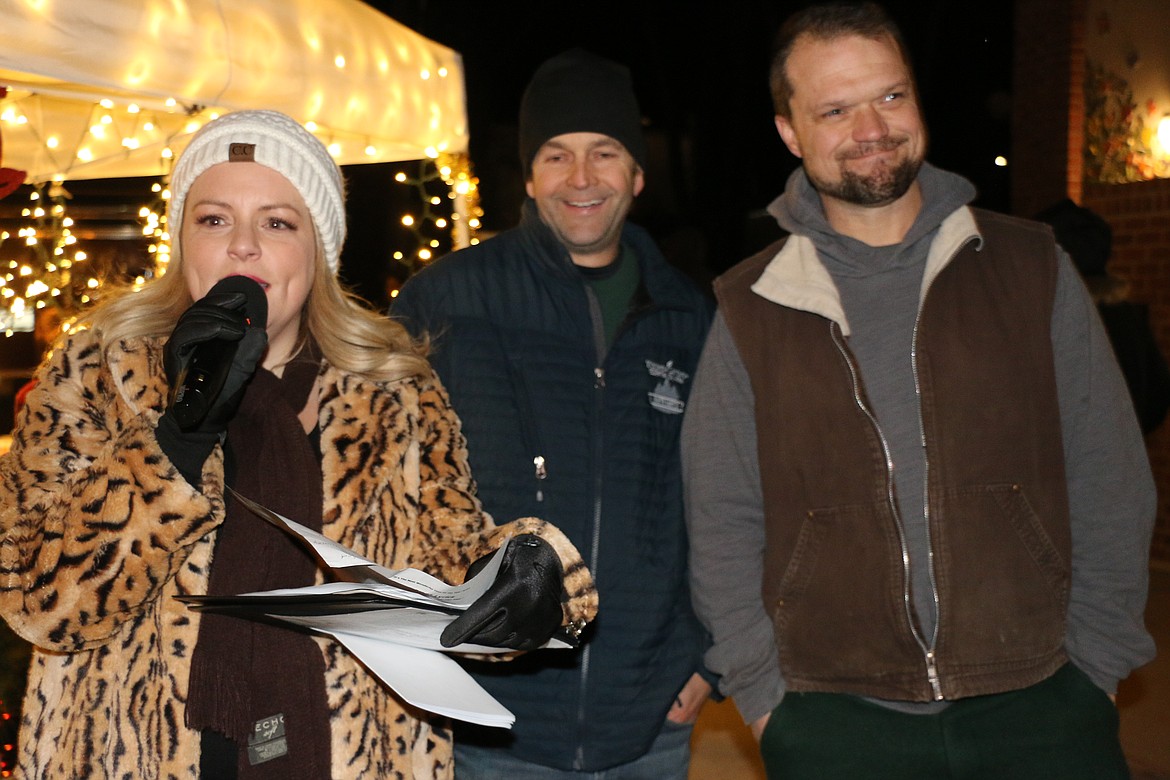 (Photo by CAROLINE LOBSINGER)
Young Living Highland Flats officials are thanked for their donation of the town's Christmas tree lighting ceremony on Friday.