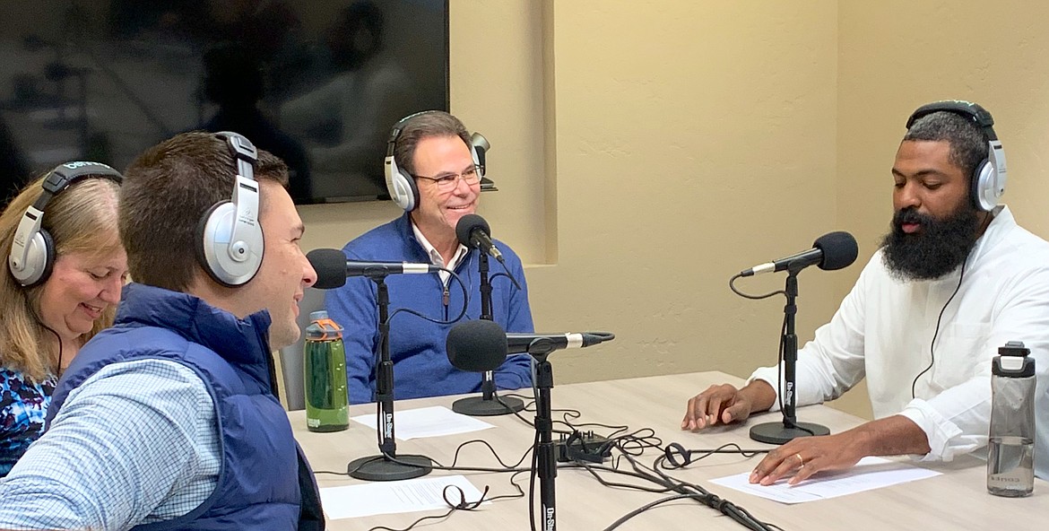 (Photo courtesy NORTH IDAHO COLLEGE)
Guests and the host of North Idaho College&#146;s new podcast &#147;NIC Amped!&#148; prepare in November to record the show&#146;s recently released first episode. Pictured from left: Gail Ballard, guest; Ryan Arnold, guest; NIC President Rick MacLennan, guest; and host Tyler Sea.