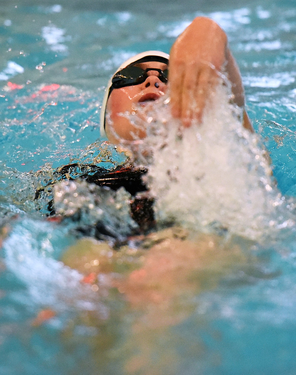 Columbia Falls' Emerald Templin swims in the girls 200 yard medley relay during the Kalispell Invitational at The Summit on Saturday. (Casey Kreider/Daily Inter Lake)