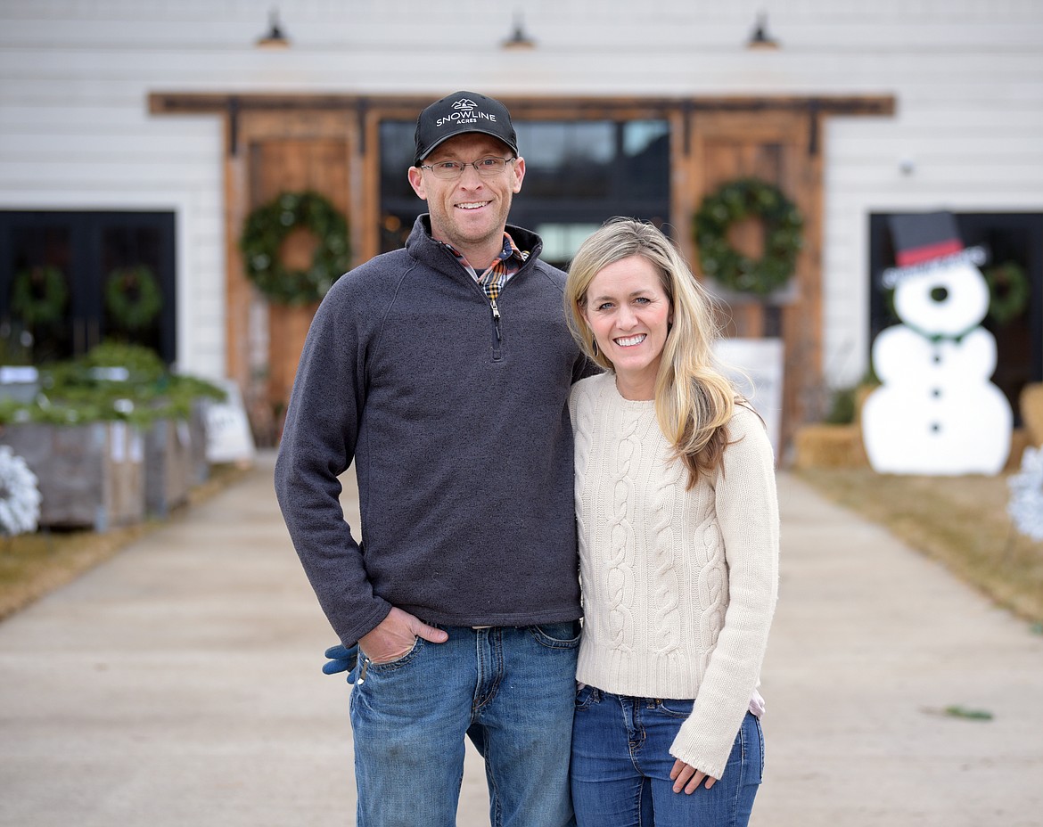 Tom and Kristin Davis in front of the new event venue Snowline Acres on Thursday, Dec. 5.