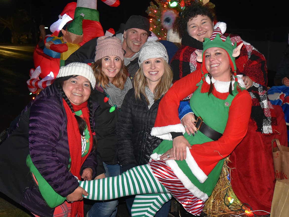 The Chamber of Commerce float carried Elf in Charge Laura Gadwa as well as Shari Ruiz, Katie Elletson, Chelsea Hagen, Darell Elletson and Andrea Robinson. (Jeremy Weber photo)