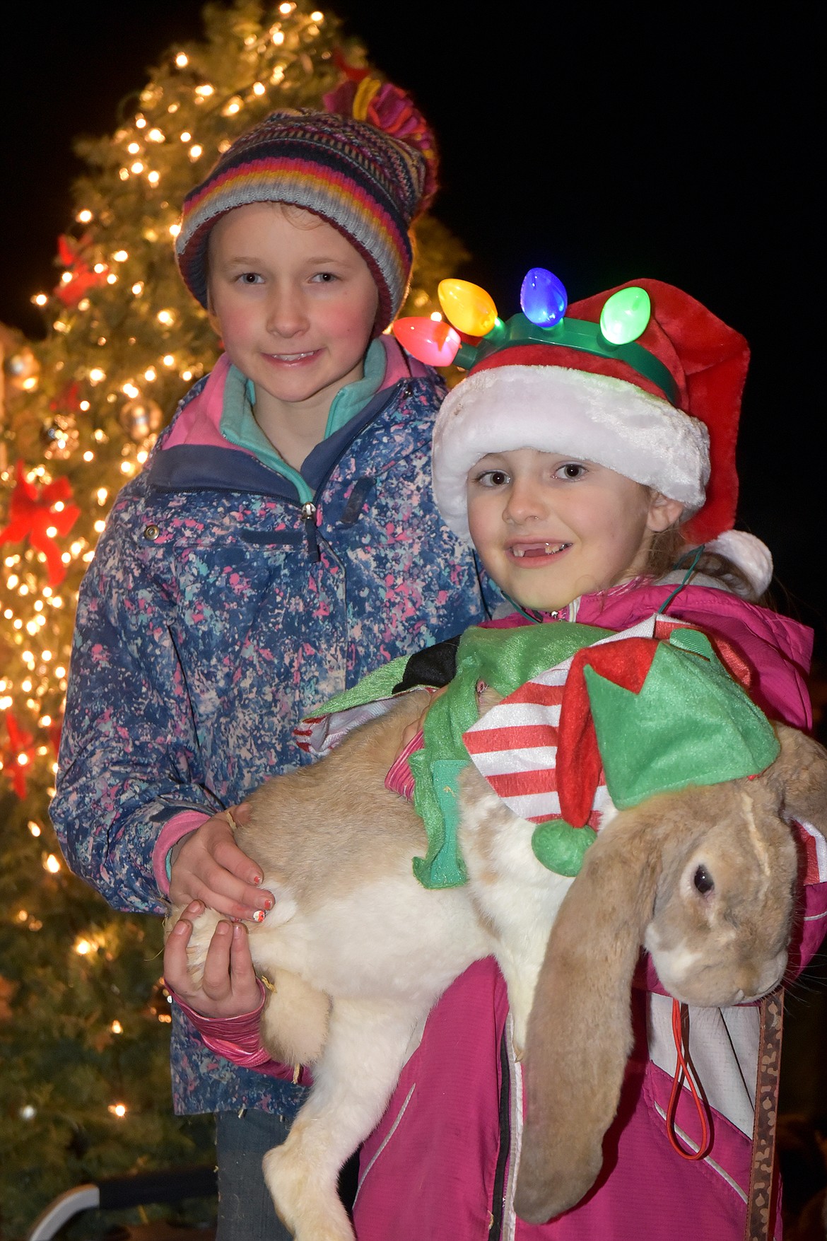 Olivia Martin and Sidni Sorsenson and their bunny on the Grandview Supreme float. (Jeremy Weber photo)