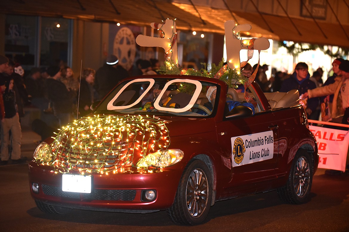 The Columbia Falls Lions Club and their &#147;Reindeer&#148; car. (Jeremy Weber photo)