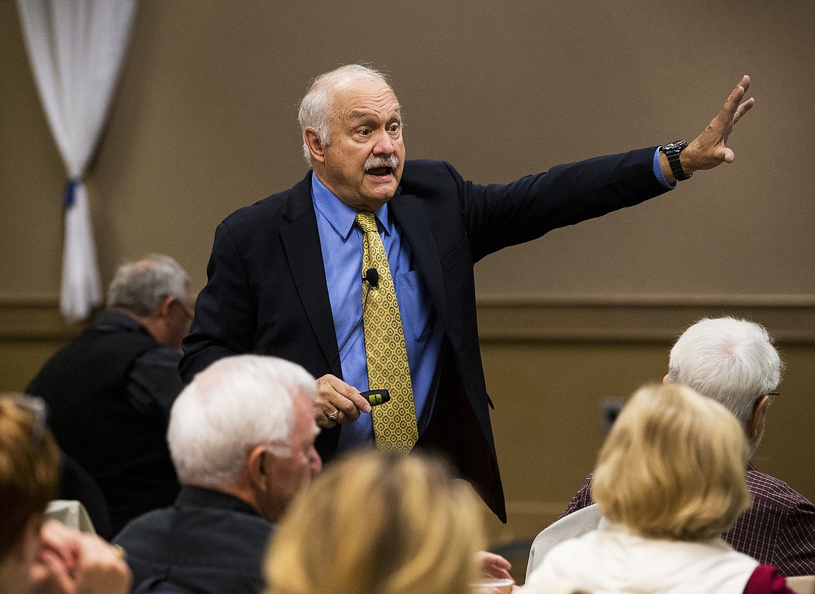 Dr. John Mitchell gives a presentation on economic incentives, in 2017 before a packed house at The Coeur d'Alene Inn. Mitchell's annual talks were a highlight of CDA Chamber leader Steve Wilson's efforts to connect with the business community. (LOREN BENOIT/Press File)