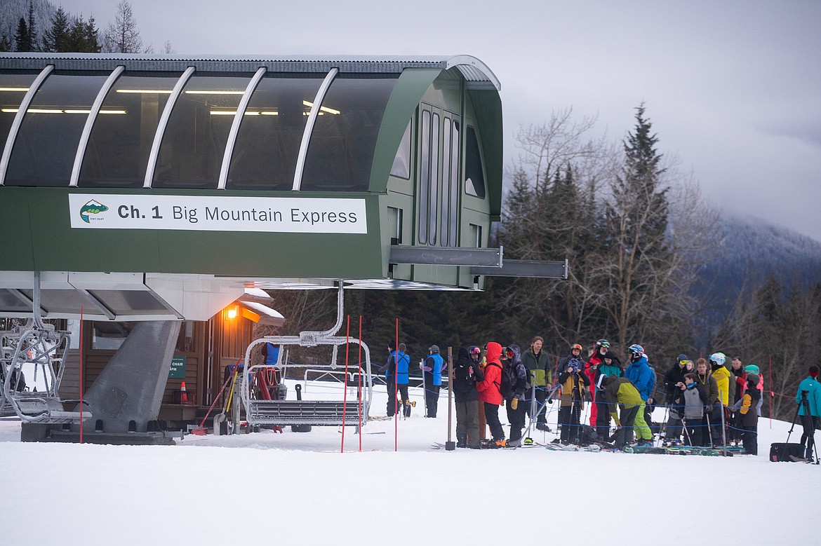 Skiers young and old waited for the first lift rides of the season at Whitefish Mountain Resort, which opened today. (Daniel McKay/Whitefish Pilot)