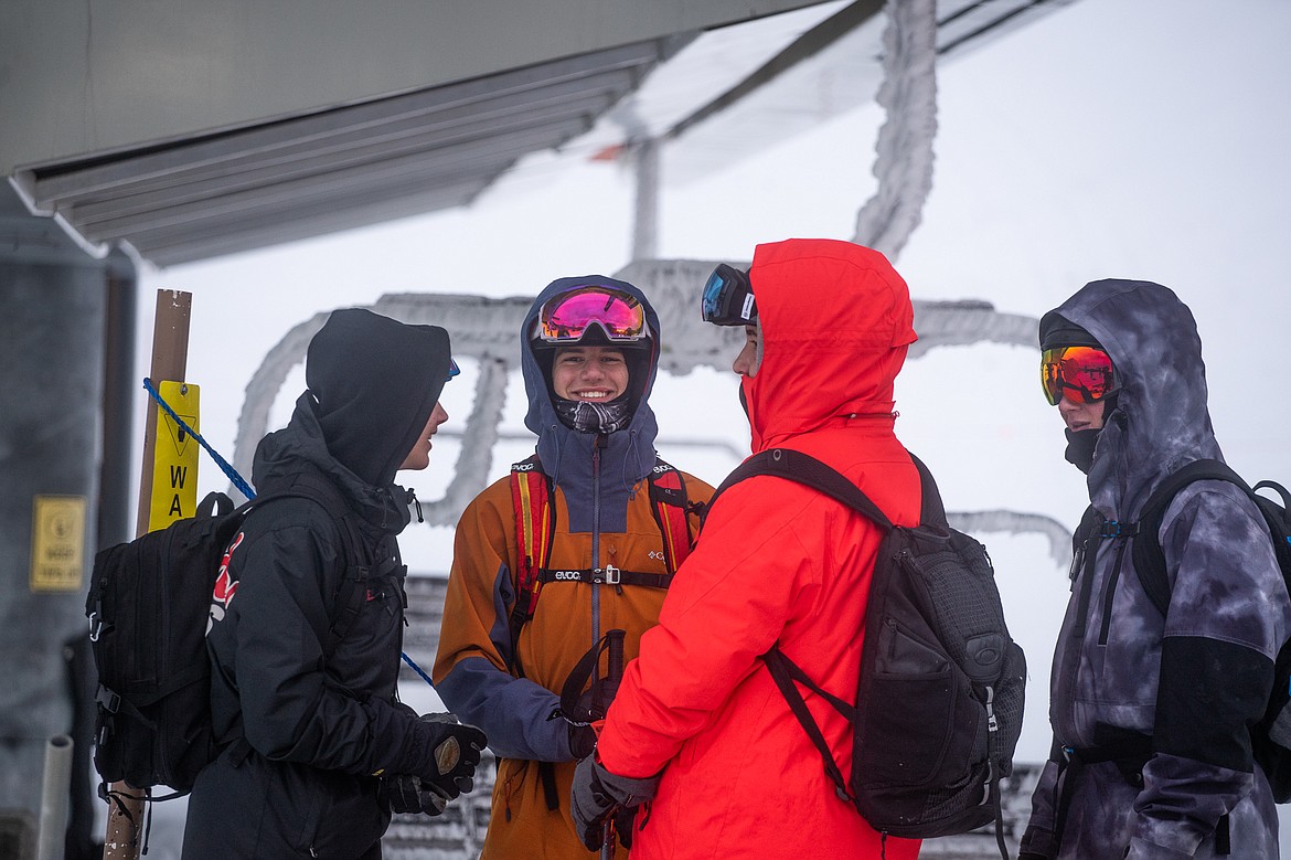 Skiers young and old waited for the first lift rides of the season at Whitefish Mountain Resort, which opened today. (Daniel McKay/Whitefish Pilot)