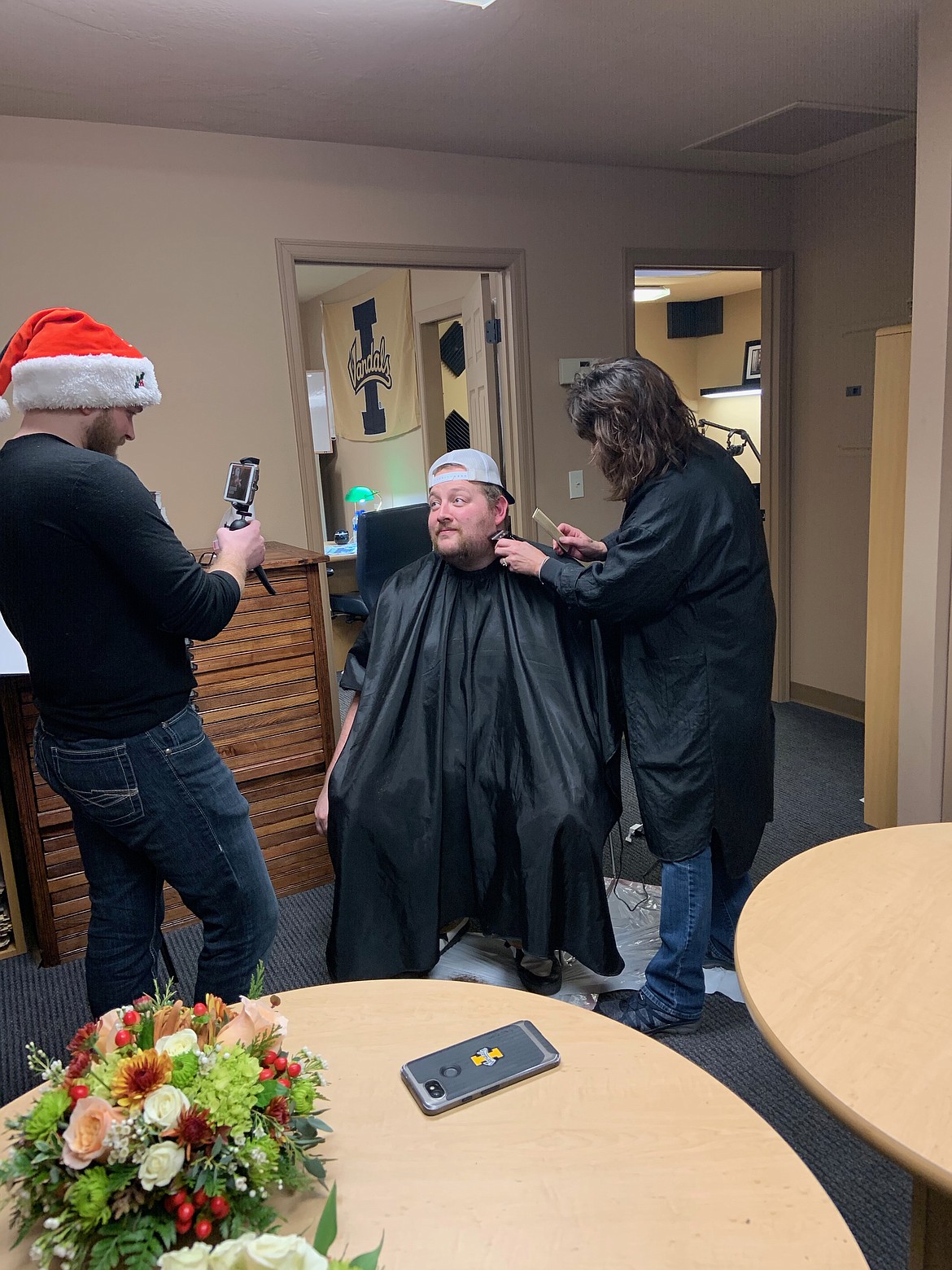 Photo by ARIANA McDONALD
News-Press staff reporter Josh McDonald had his beard shaved off on Facebook Live after resident Danny Kenyon donated $250.
