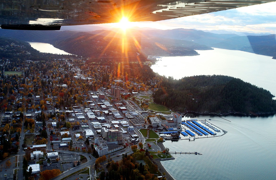 LOREN BENOIT/Press file
The sun rises over Lake Coeur d&#146;Alene, as seen from an airplane piloted by Zachary Pearson.