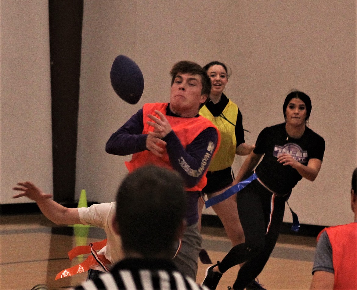 BRAYDEN GOOD attempts to catch the ball, behind him is Madison Elliott. (John Dowd/Clark Fork Valley Press)