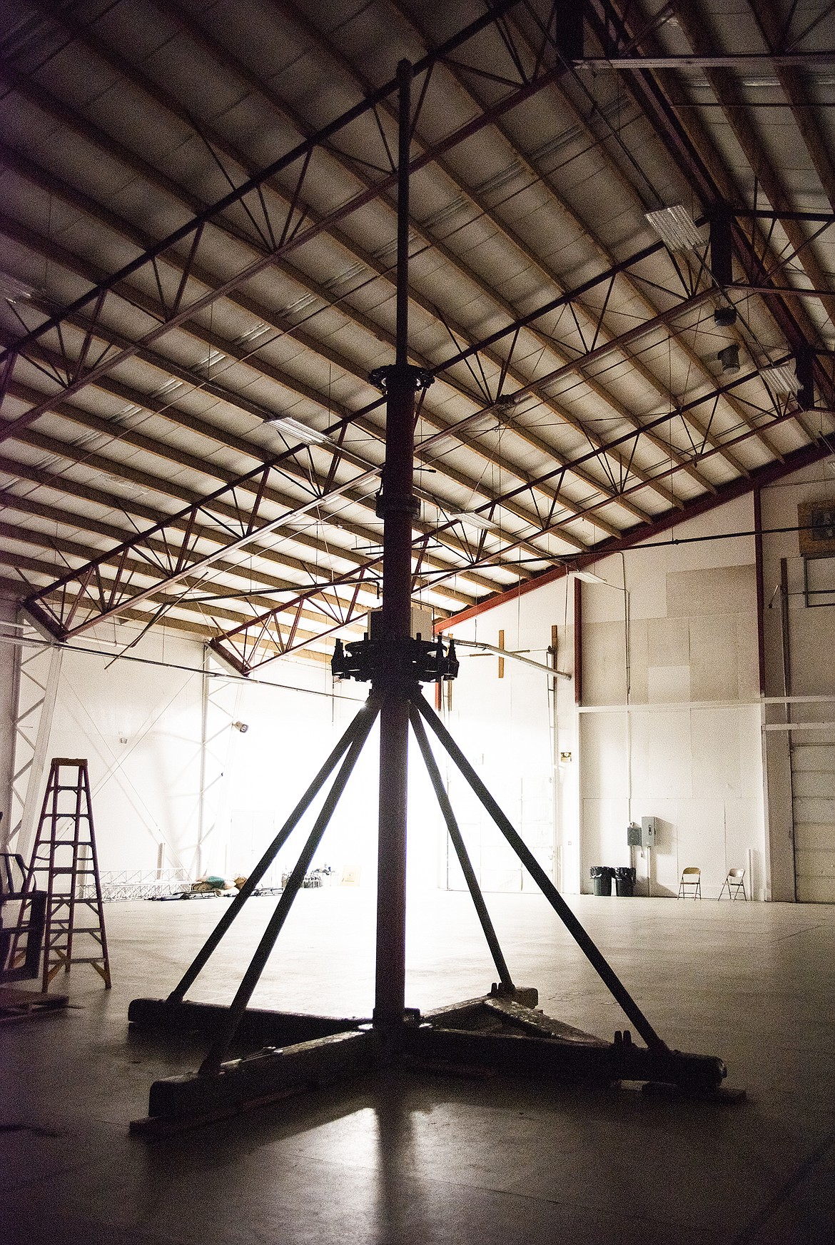 (Photo courtesy CLAY HUTCHISON)
The half-ton center pole for the Carousel of Smiles, pictured here before its recent refurbishement, bears the weight of 36 ponies, two chariots and riders. The pole now has a smooth surface and a fresh coat of paint after a trio of Triangle Drive businesses took it in for various stages of refubishment.